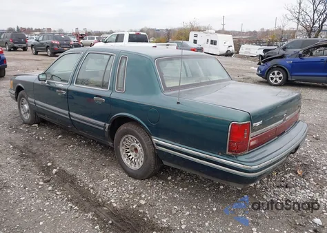 1994 Lincoln Town Car Executive z USA, uszkodzony, nr VIN 1LNLM81W6RY649993